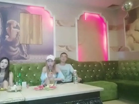 Wild group sex in Chinese KTV with a sitting lady