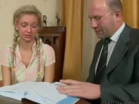 Young blonde student learns from experienced old teacher